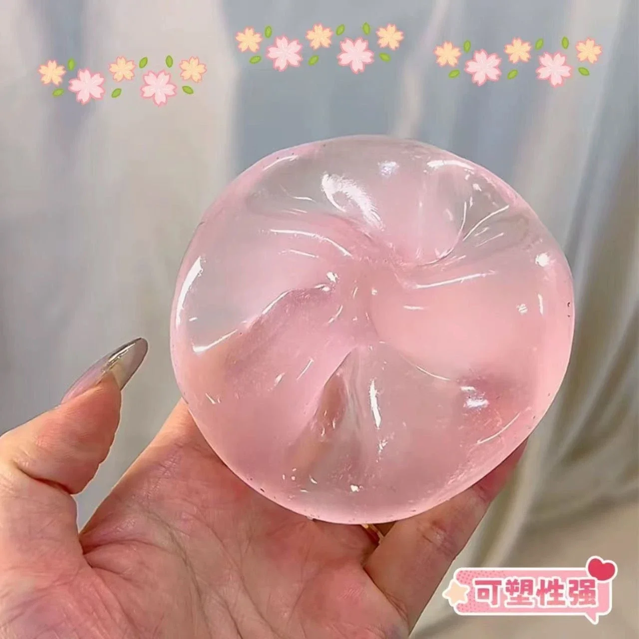 Balle anti-stress rose déformée