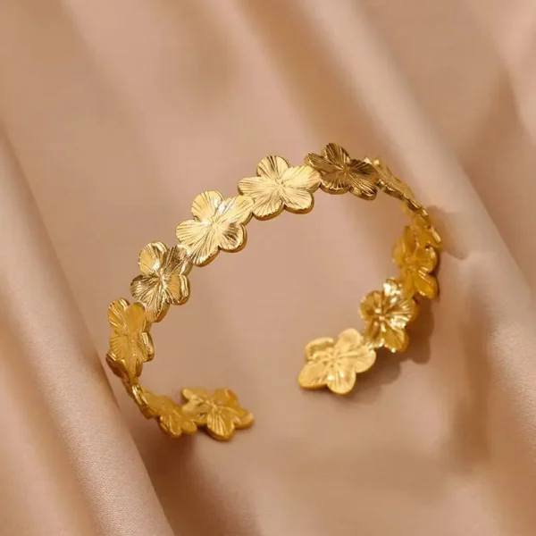 Bracelet manchette fleurs dorées