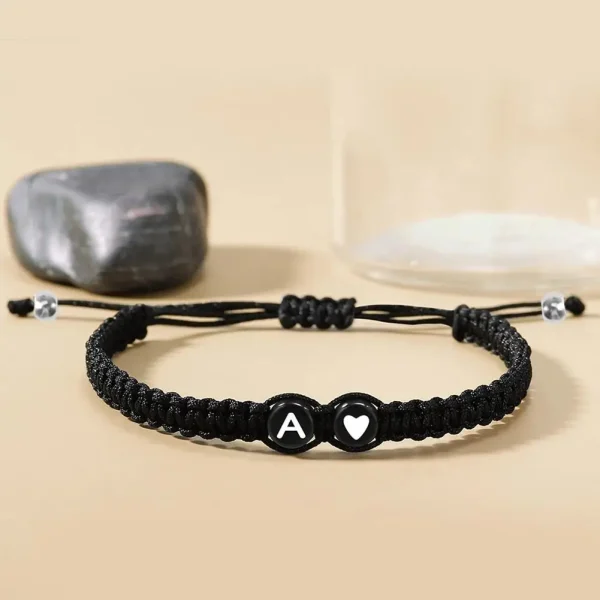 Bracelet tressé noir initiale et cœur