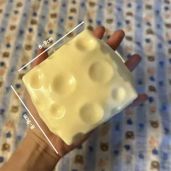 Dimensions du cube fromage : 8 à 9 cm