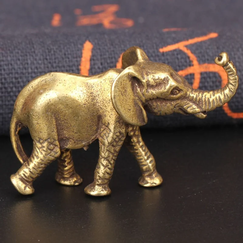 Éléphant en laiton trompe levée