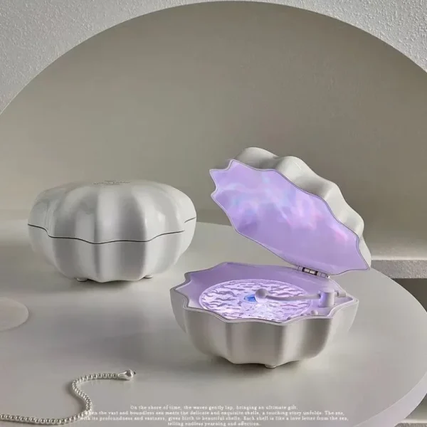Enceinte Bluetooth coquillage à projection lumineuse