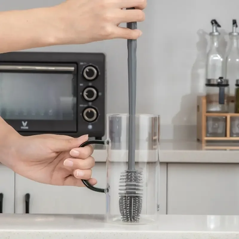 Goupillon dans une bouteille