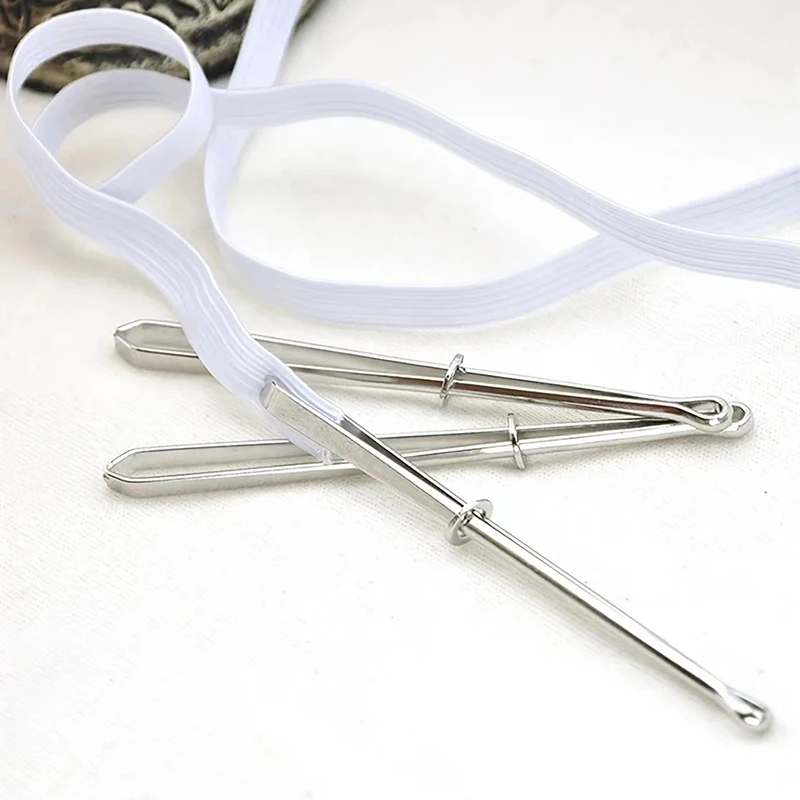Passe-élastiques à pince avec élastique blanc