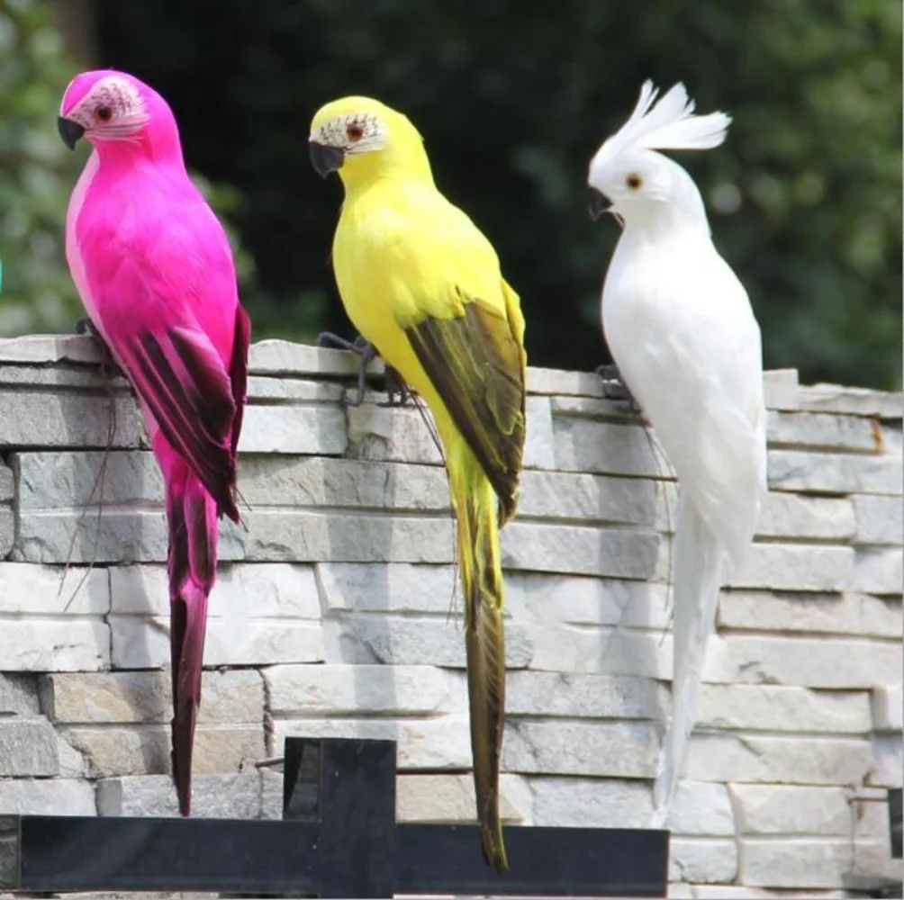 Perroquets fuchsia, jaune et blanc