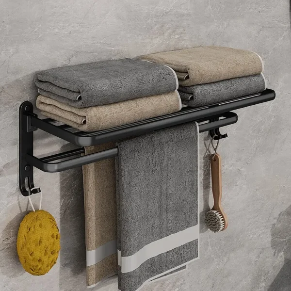 Porte-serviettes avec serviettes et brosses