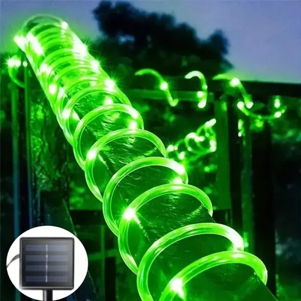 Tube lumineux vert sur une clôture