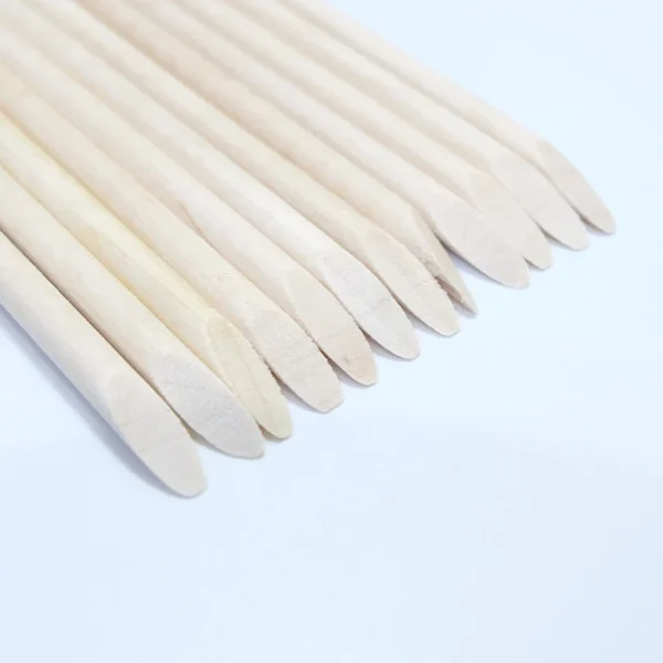 Bâtonnets en bois d'oranger pour cuticules : détail