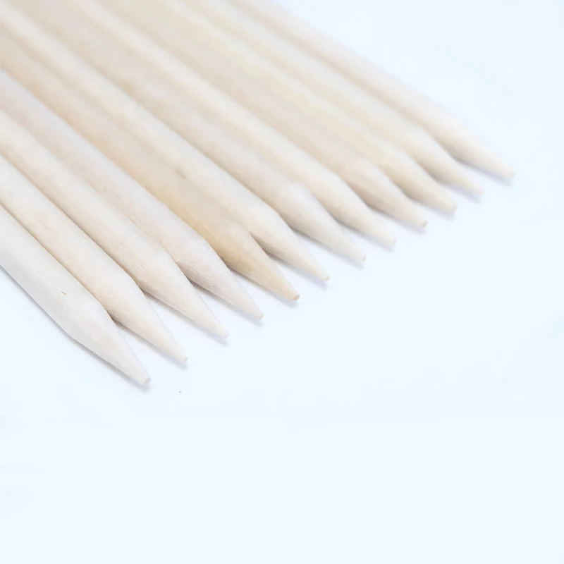 Bâtonnets en bois d'oranger pour cuticules : détail