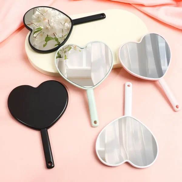 Miroir à main en forme de cœur