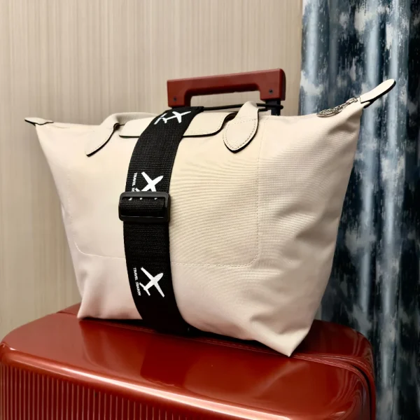 Sangle de valise motif avion : détail